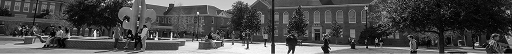 Students walking on college campus.
